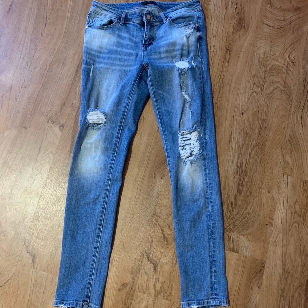 Buckle Black distressed stretch jeans size 27